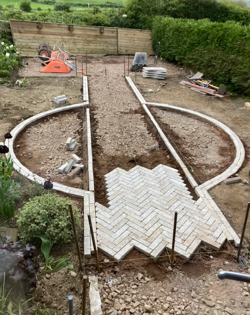 Dijon Herringbone Tumbled Path Construction