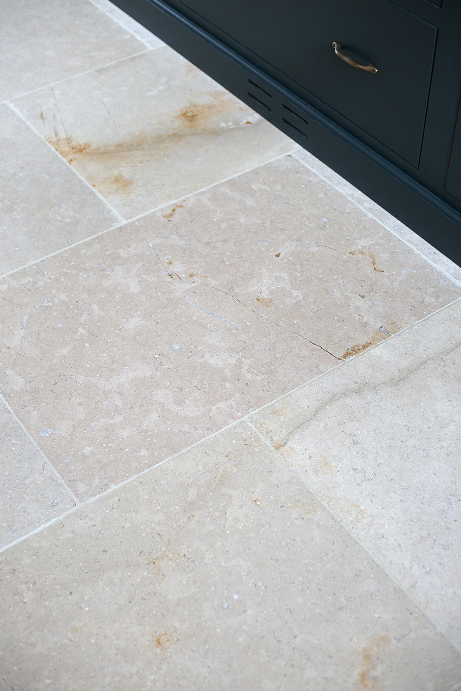 Dijon Blend Tumbled Limestone Kitchen Flooring Closeup