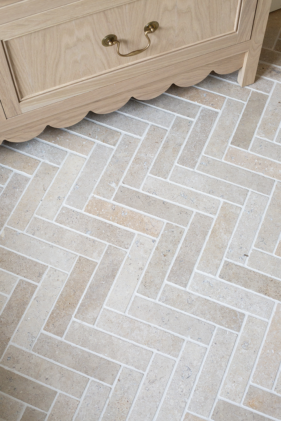 Dijon Tumbled Herringbone Bathroom Tiles Closeup